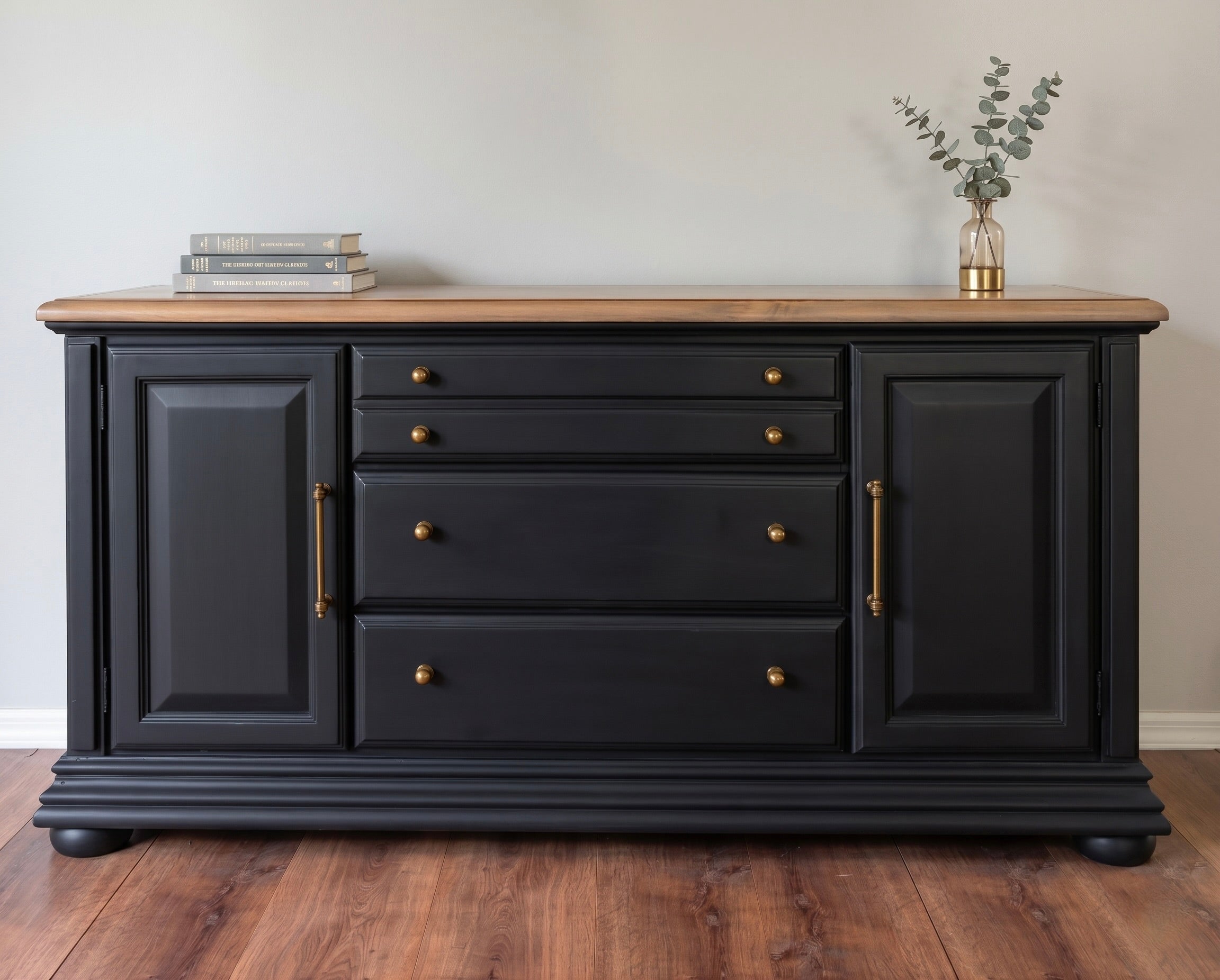 Black Restored and Refinish sideboard with wooden top on a wooden floor